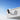ieGeek ZY-C1 battery powerd security camera on a metal surface with a clear blue sky background