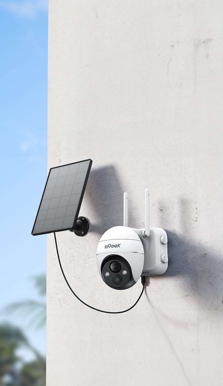 ieGeek outdoor security camera with solar panel attached to a wall
